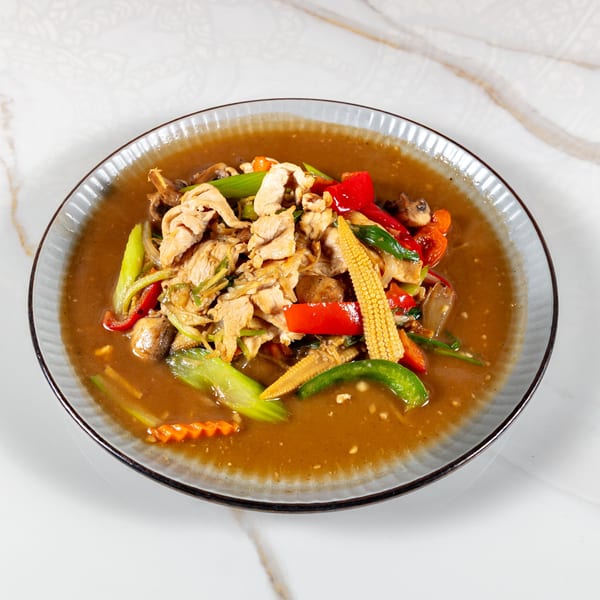 Stir-fried chicken with baby corn, bell peppers, mushrooms, and green onions in a savory brown sauce.